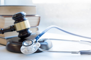 Gavel and doctor stethoscope.